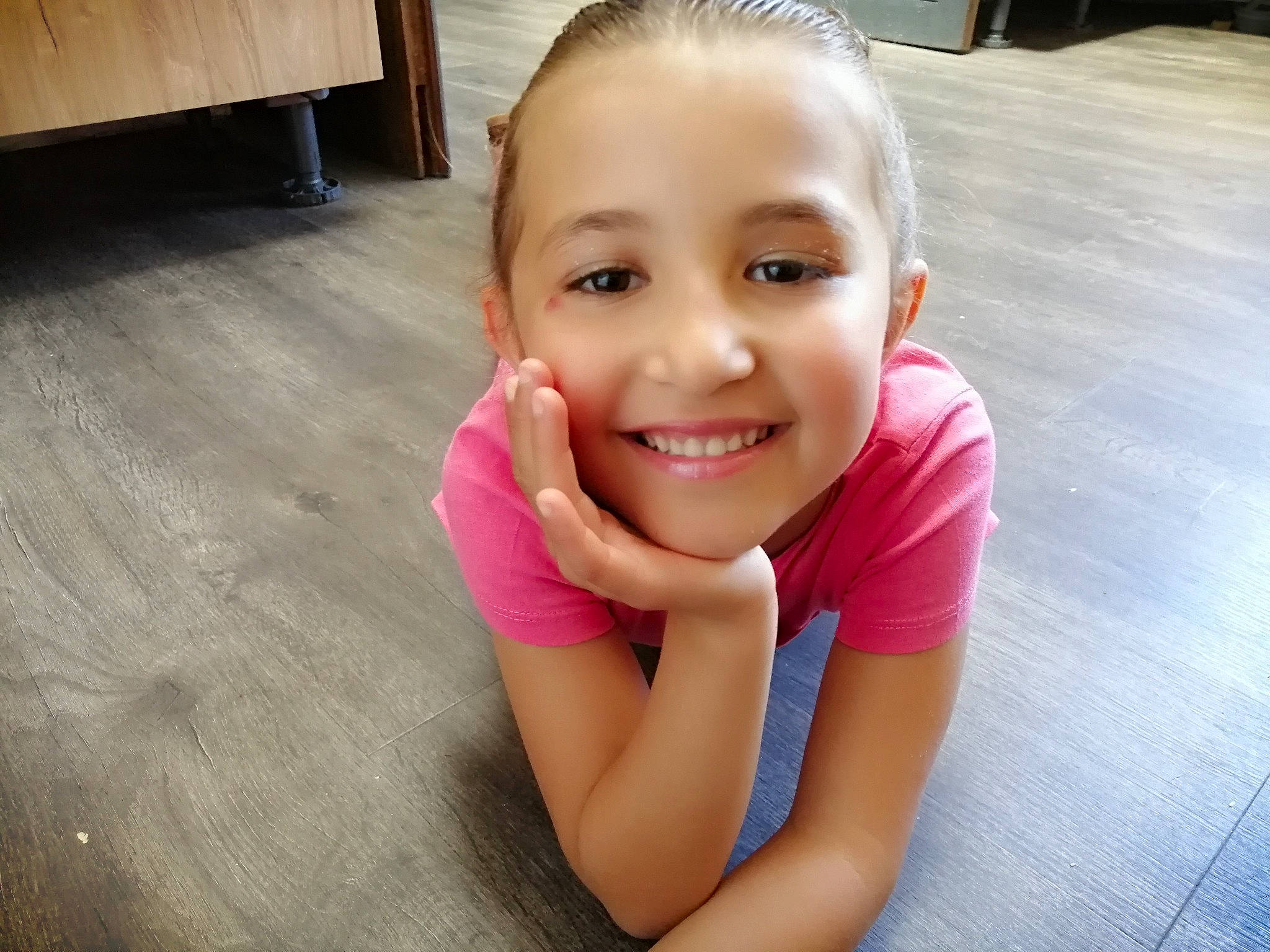 Janelle participe au concours pour gagner de l'argent avec cette photo : black_hair, elbow, eyebrow, eyelash, flash_photography, floor, flooring, happy, hardwood, human_leg, iris, joy, leisure, lip, long_hair, neck, person, skin, smile, thigh