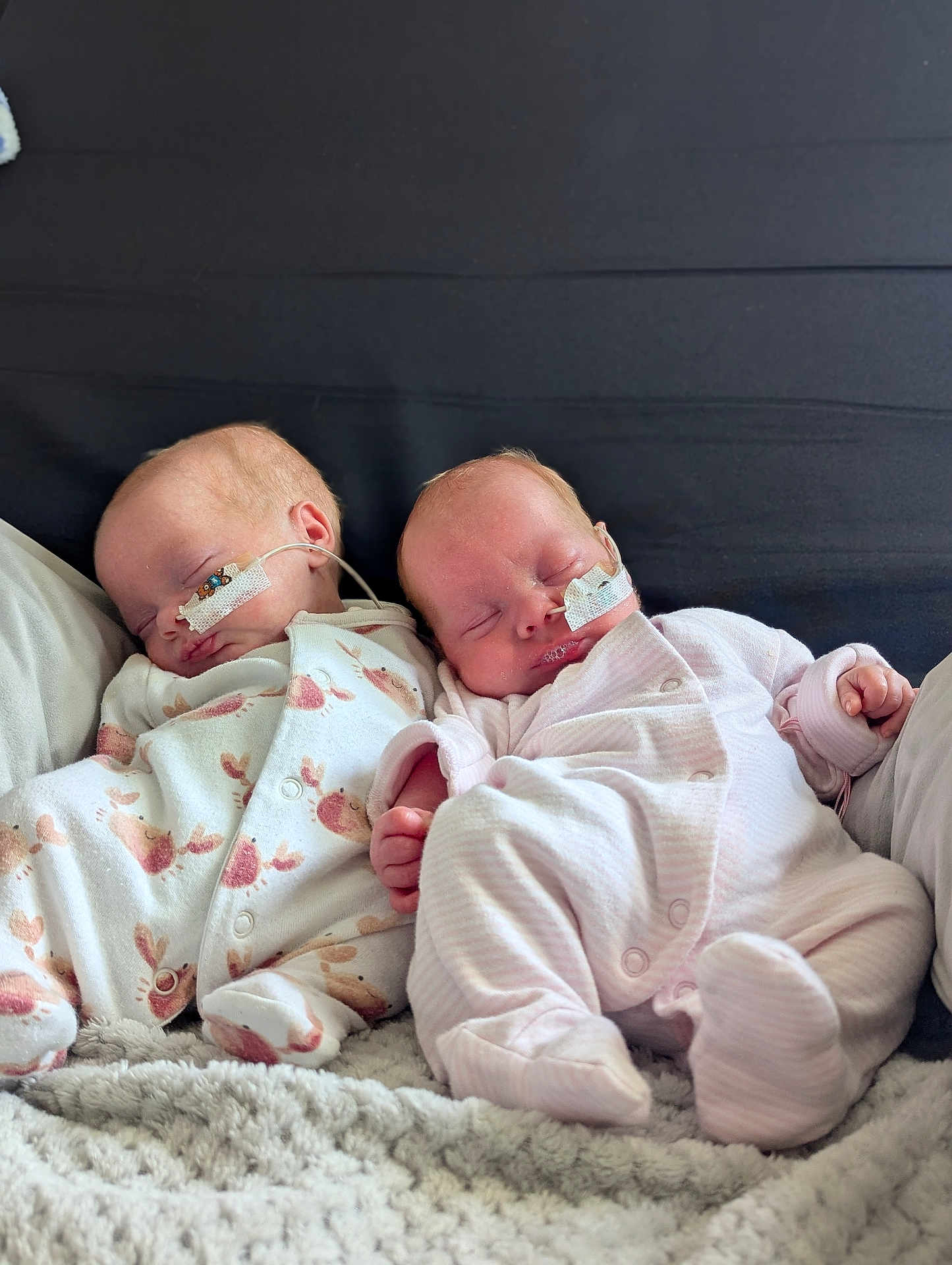Luna And Lyla joined the competition — help win amazing prizes! baby, newborn, sleeping, infant, onesie, medical_tube, blanket, cozy, cute, peaceful, child, toddler, face, pink, white, pattern, rest, bed, soft, healthcare