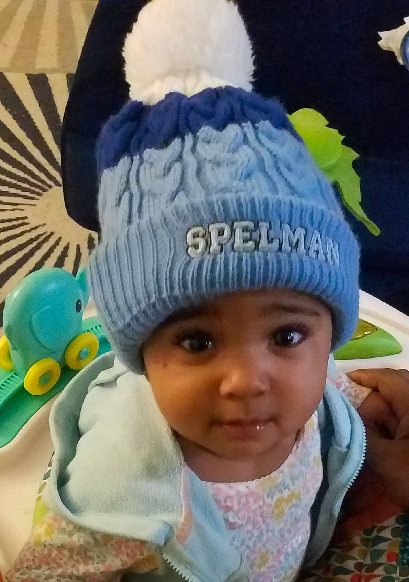 Sydney is registered to the contest to win money with this photo: baby, beanie, bonnet, cap, child, clothing, hat, headgear, headwear, knit_cap, person, toddler, wool