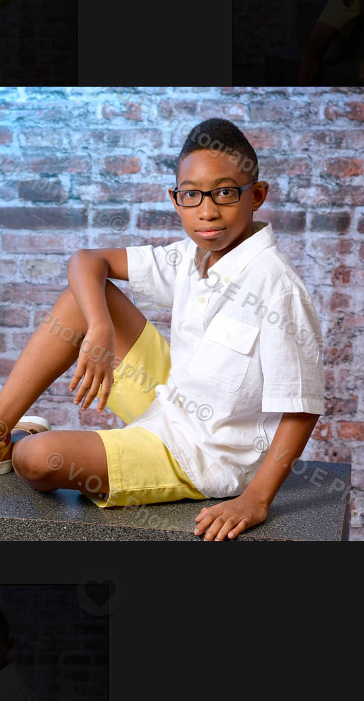 Brent is registered to the contest to win money with this photo: black_hair, eyewear, glasses, lady, leg, person, photo_shoot, photography, sitting, stock_photography, temple