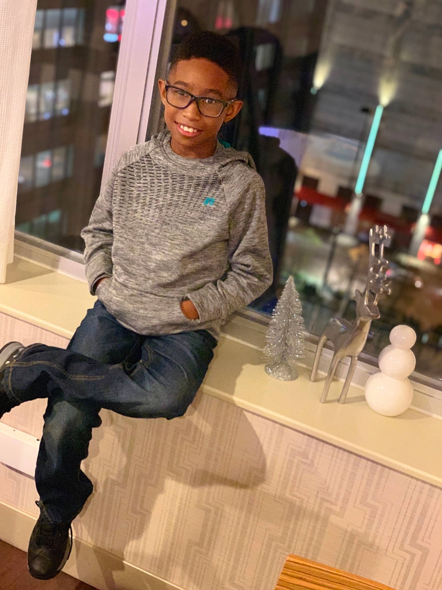 Brent joined the competition — help win amazing prizes! denim, eyewear, fashion, footwear, glasses, jacket, jeans, joy, leg, outerwear, person, shoe, sitting, smile, snapshot, style, textile, vision_care