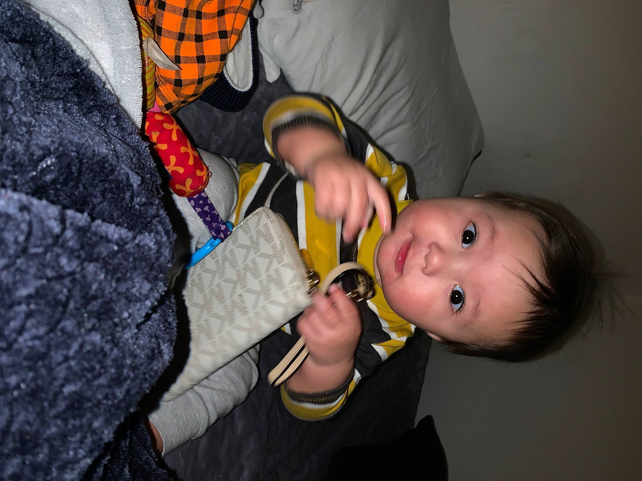 Kason is registered to the contest to win money with this photo: baby, baby_products, cheek, child, ear, eyelash, finger, fun, gesture, hand, happy, headgear, mouth, nail, nose, person, personal_protective_equipment, sitting, skin, smile