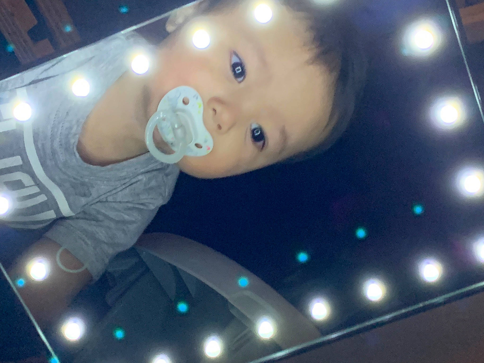 Kason is registered to the contest to win money with this photo: astronaut, automotive_lighting, ceiling, child, circle, display_device, electric_blue, entertainment, event, flash_photography, flat_panel_display, fun, led_backlit_lcd_display, leisure, light, night, person, space, technology, toddler