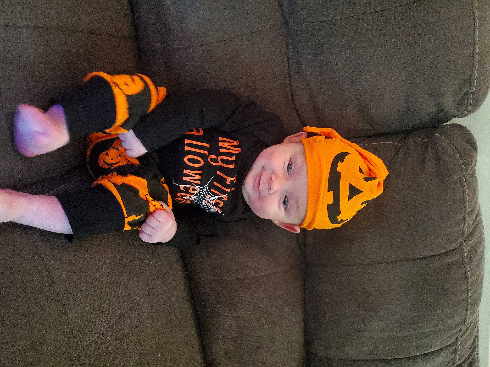 Campbell joined the competition — help win amazing prizes! baby, baby_products, baby_toddler_clothing, bean_bag, bean_bag_chair, car_seat, child, comfort, fun, hat, headwear, orange, person, personal_protective_equipment, room, sitting, sleeve, sock, toddler