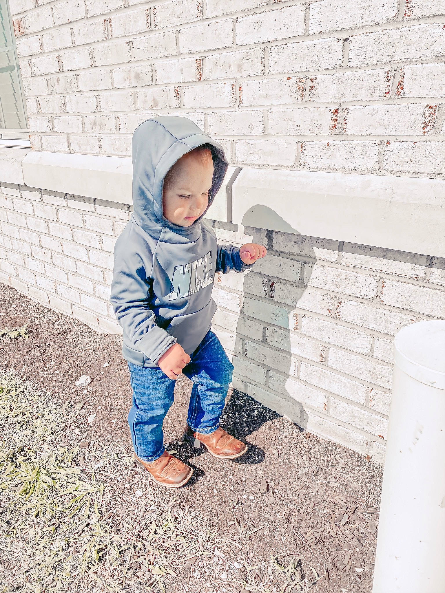 Bryer joined the competition — help win amazing prizes! baby, brick, child, denim, footwear, hood, hoodie, jacket, jeans, outerwear, person, play, shoe, sitting, sleeve, standing, toddler, vacation, wall