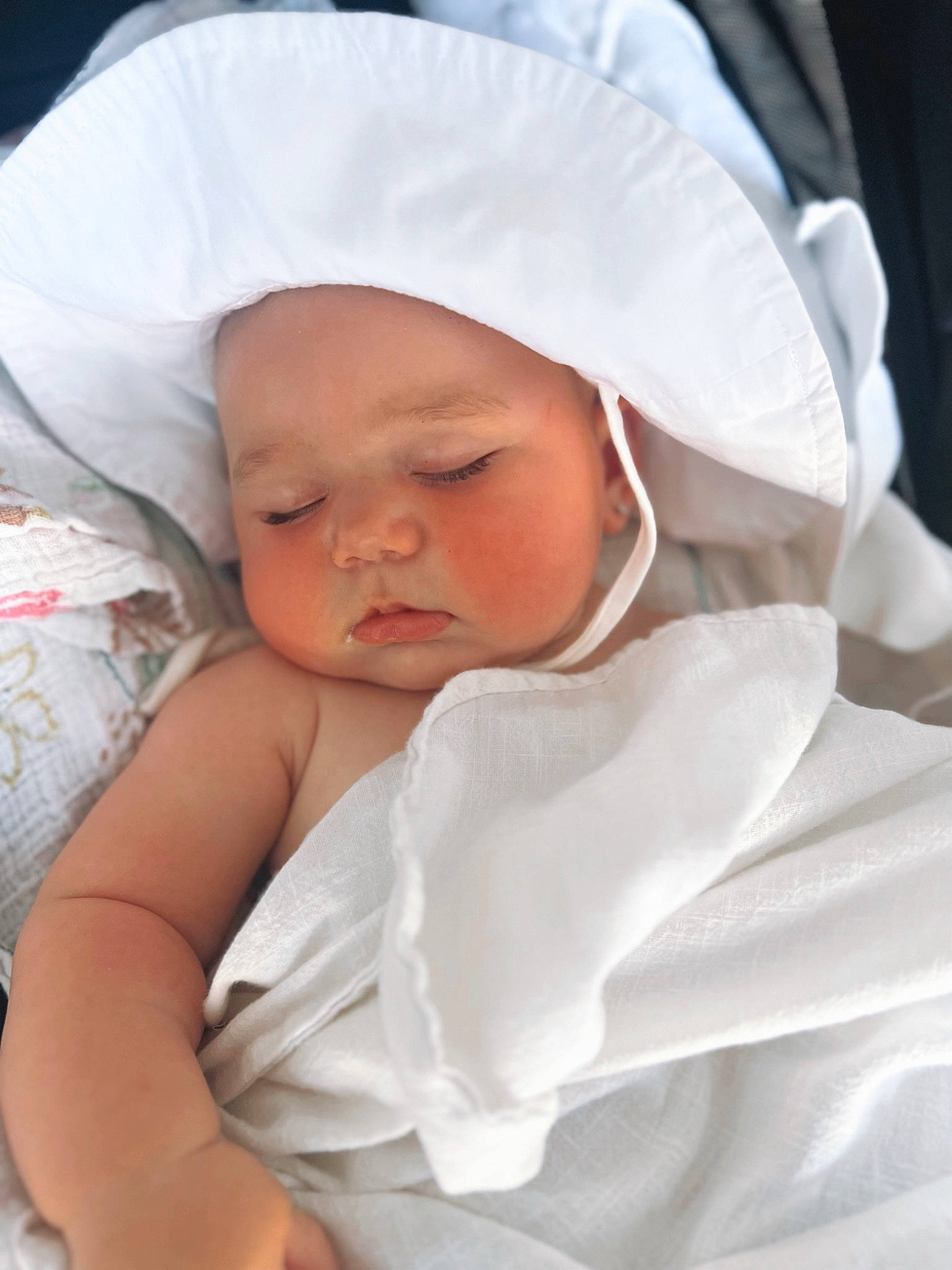 Emilia is registered to the contest to win money with this photo: baby, baby_sleeping, baby_toddler_clothing, cap, child, comfort, happy, hat, headwear, linens, person, skin, thumb, toddler
