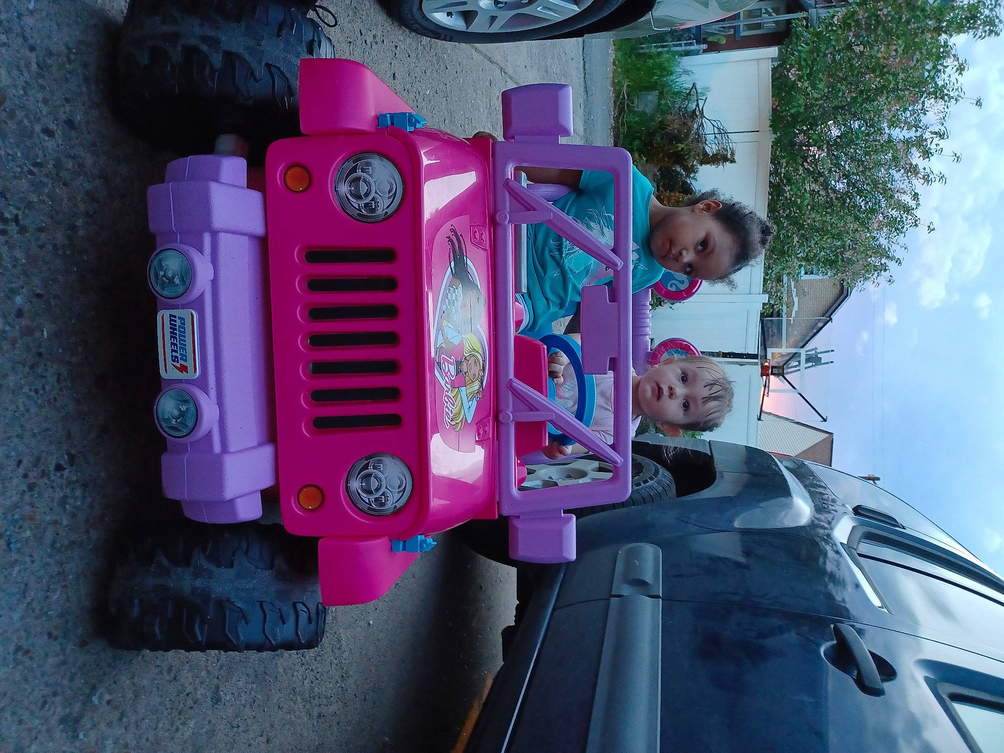 Annabella joined the competition — help win amazing prizes! auto_part, automotive_design, automotive_exterior, automotive_tire, bumper, car, fender, magenta, mode_of_transport, motor_vehicle, person, pink, plant, purple, sky, smile, tire, tree, under_exposed, vehicle