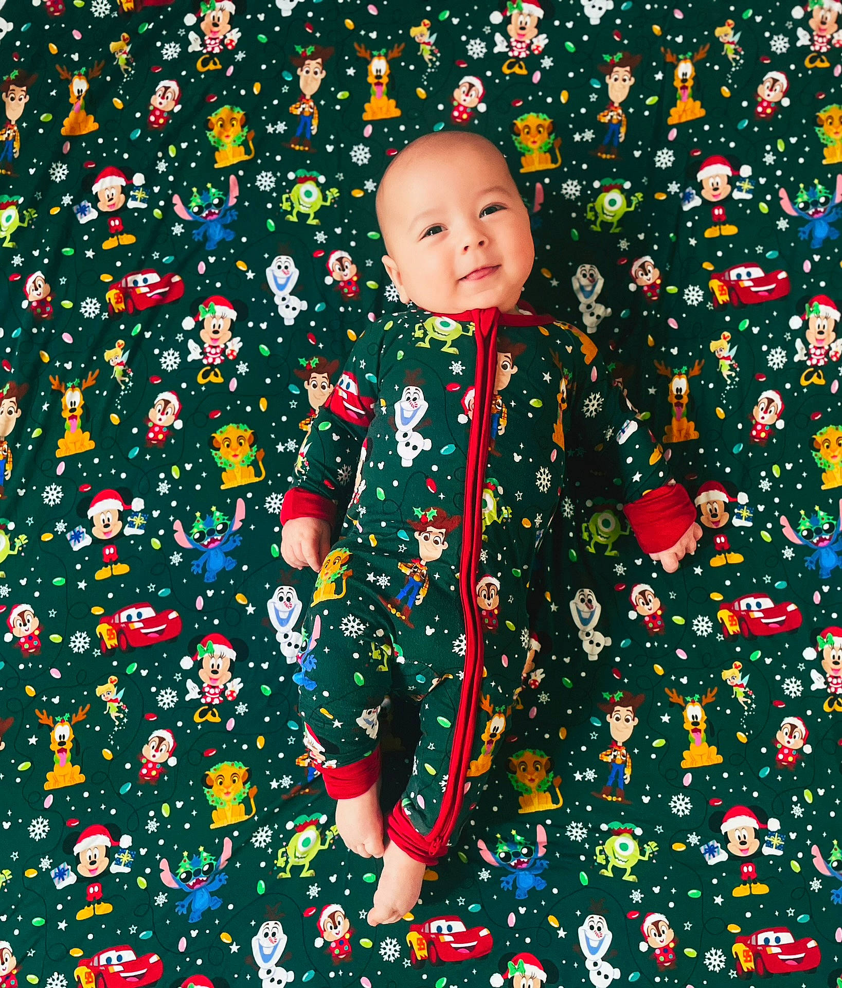 Luca is registered to the contest to win money with this photo: baby, baby_toddler_clothing, carmine, christmas, christmas_decoration, christmas_eve, collar, coquelicot, event, grass, happy, holiday, joy, leaf, pattern, people_in_nature, person, plant, sleeve, smile