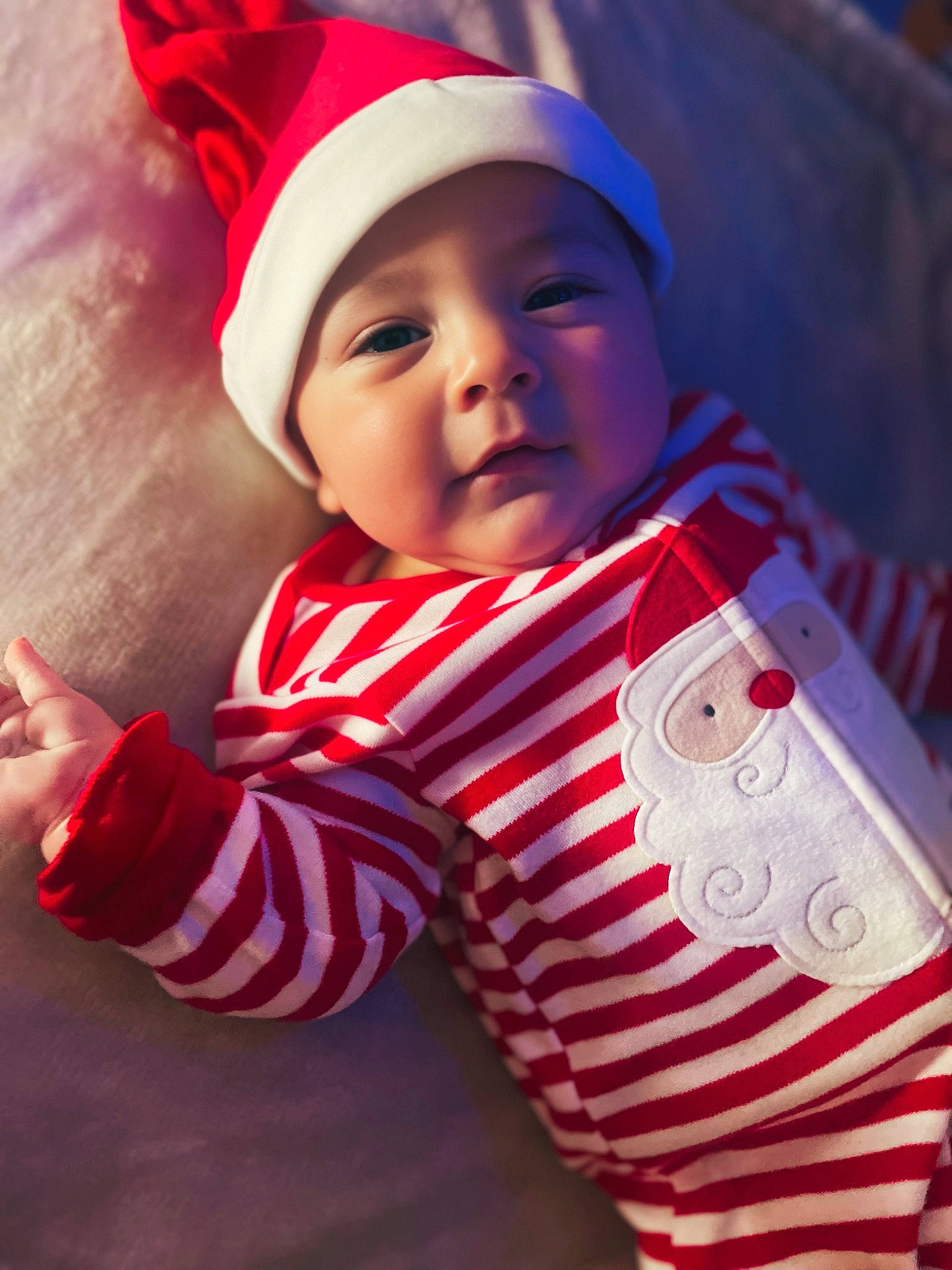 Luca joined the competition — help win amazing prizes! baby, baby_toddler_clothing, cap, carmine, child, christmas, christmas_eve, costume_hat, event, face, happy, hat, headwear, holiday, pattern, person, plant, santa_claus, sleeve, smile