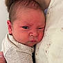 Adam participe au concours pour gagner de l'argent avec cette photo : newborn, baby, infant, face, expression, skin, person, adult, closeup, head, clothing, shirt, human, family, parent, holding, care, love, tender, resting