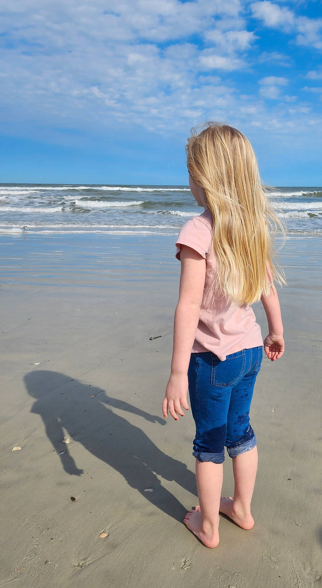 Kylee joined the competition — help win amazing prizes! azure, barefoot, beach, body_of_water, cloud, coastal_and_oceanic_landforms, happy, horizon, leg, people_in_nature, people_on_beach, person, shoulder, sky, summer, sunlight, t_shirt, thigh, waist, water