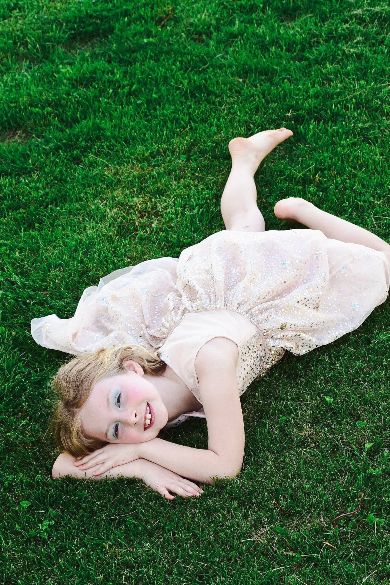 Camryn joined the competition — help win amazing prizes! barefoot, blond, flash_photography, flooring, foot, gesture, grass, grass_family, grassland, happy, human_body, human_leg, joy, knee, lawn, meadow, people_in_nature, person, plant, smile