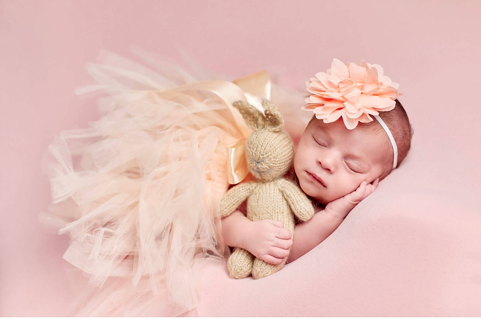 Ailani joined the competition — help win amazing prizes! baby, baby_sleeping, baby_toddler_clothing, child, costume_hat, embellishment, eyelash, fashion_accessory, finger, hair_accessory, headband, headgear, headpiece, headwear, jewellery, linens, nail, peach, person, petal