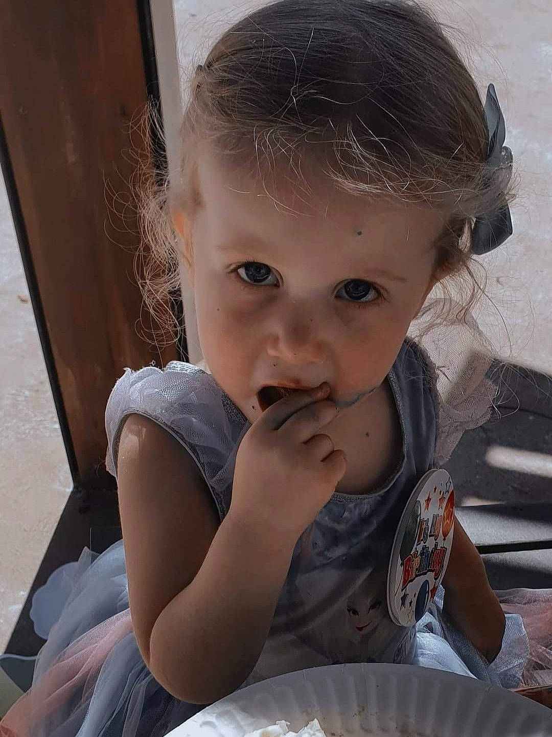 Alaia is registered to the contest to win money with this photo: baby, breakfast, cheek, child, comfort_food, drinkware, eating, eyelash, food_craving, fun, happy, lip, nose, person, plate, sitting, sweetness, tableware, toddler, vacation