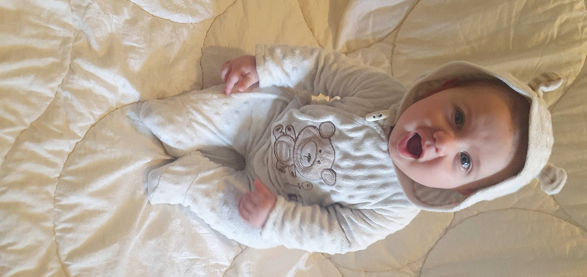 Atlus is registered to the contest to win money with this photo: baby, baby_toddler_clothing, bedding, bedtime, cheek, child, comfort, happy, linens, nap, nose, person, room, sitting, skin, sleep, sleeve, smile, textile, toddler