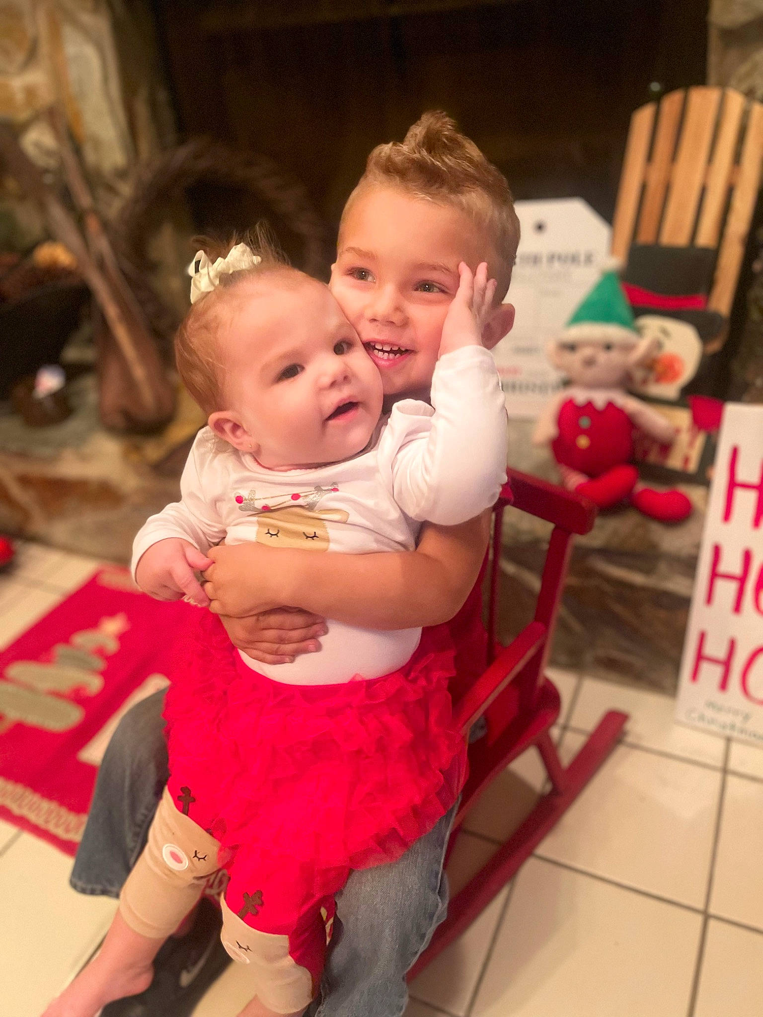 Kai is registered to the contest to win money with this photo: baby, chair, cheek, child, event, eye, face, flooring, fun, hairstyle, happy, holiday, human_body, iris, party, person, room, sitting, skin, smile