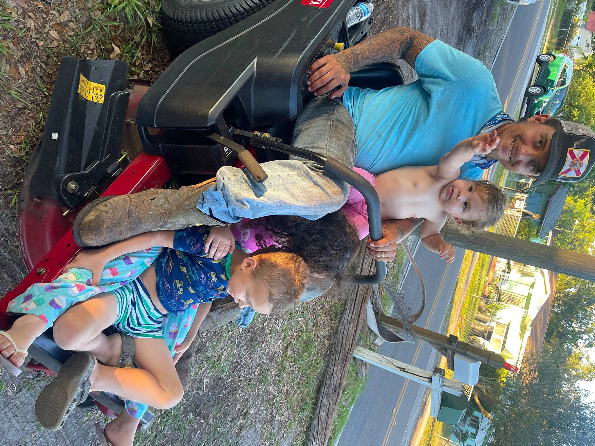 Lillyanna is registered to the contest to win money with this photo: arm, black, child, clothing, fun, green, headwear, joy, leisure, person, plant, public_space, recreation, shoe, shorts, snapshot, sneakers, spring, t_shirt, thigh