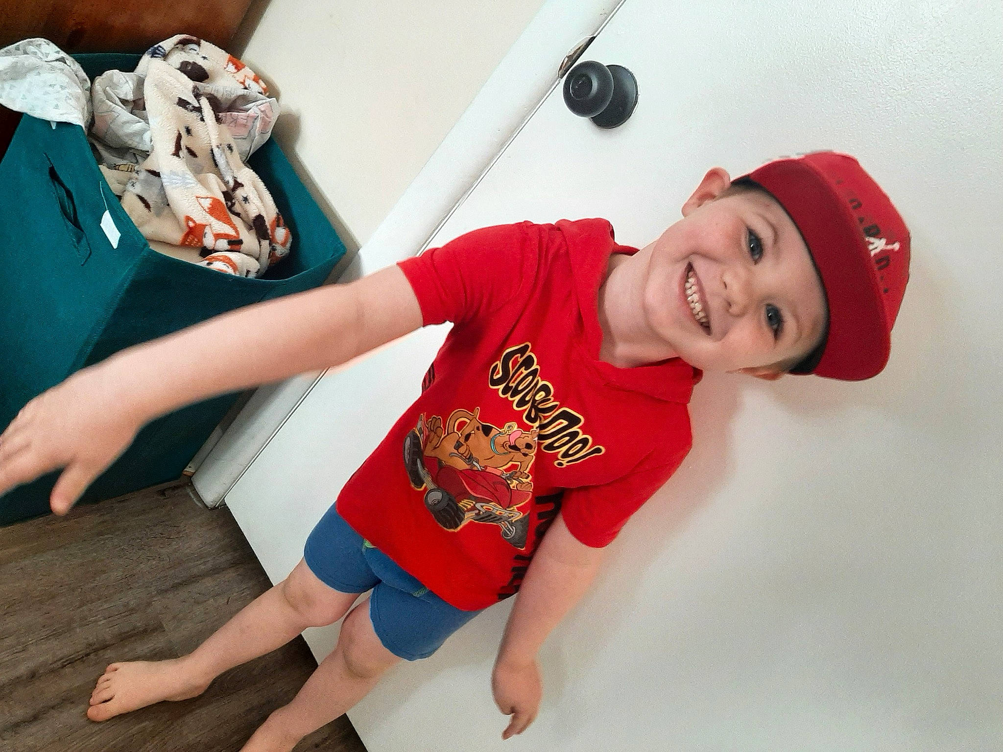 Connor joined the competition — help win amazing prizes! baseball_cap, cap, cool, elbow, flooring, fun, happy, headgear, headwear, joint, joy, knee, mouth, neck, person, shorts, shoulder, sleeve, smile, sneakers