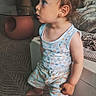 Sandro a rejoint le concours — aidez-le/la à gagner de superbes lots ! toddler, child, standing, indoor, clothing, shorts, tank_top, carpet, furniture, table, couch, curious, young_child, person, home, living_room, patterned_clothes, footwearless, cute, side_profile