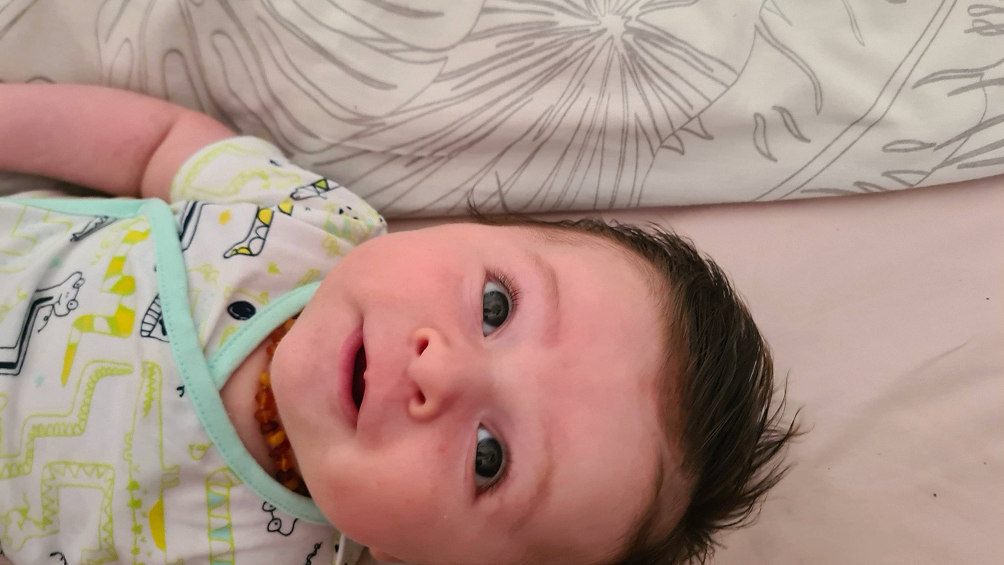 Emilio participe au concours pour gagner de l'argent avec cette photo : baby, baby_toddler_clothing, cheek, child, close_up, eyebrow, eyelash, forehead, fur, happy, iris, linens, lip, mouth, nose, pattern, person, portrait_photography, skin, toddler