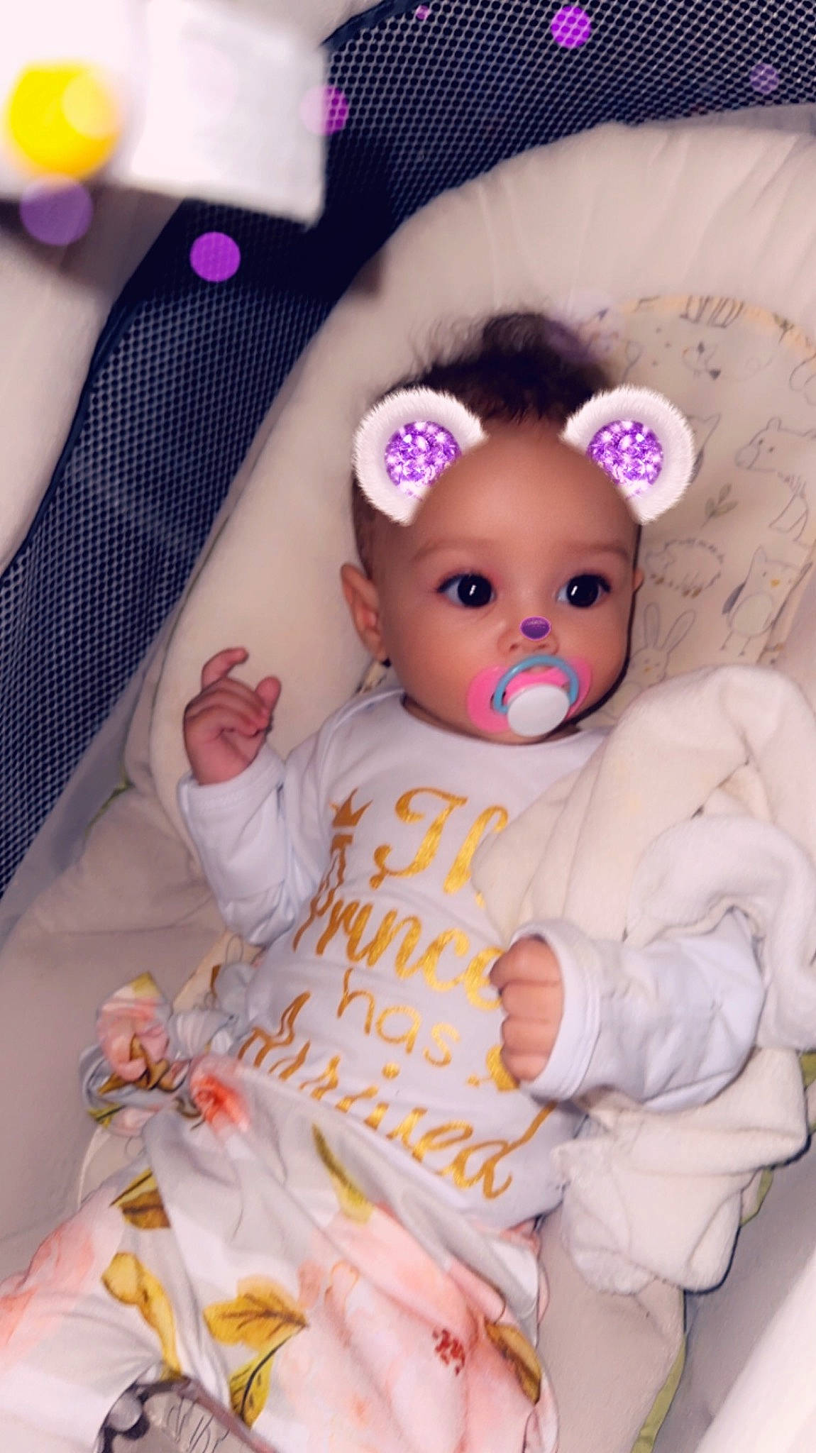 Aiyanna is registered to the contest to win money with this photo: baby, baby_toddler_clothing, bed, child, doll, ear, eye, eyelash, fawn, fur, linens, magenta, pattern, person, pink, plush, skin, stuffed_toy, teddy_bear, textile