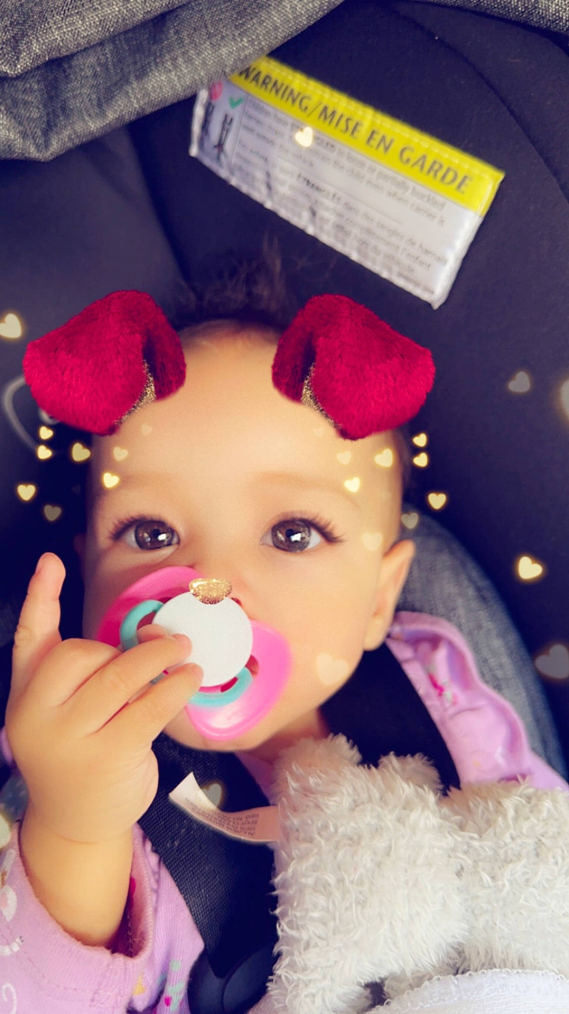 Aiyanna joined the competition — help win amazing prizes! baby, cap, cheek, child, eyelash, fashion_accessory, fun, happy, headgear, lip, magenta, nose, party_supply, person, pink, plush, purple, skin, stuffed_toy, toddler