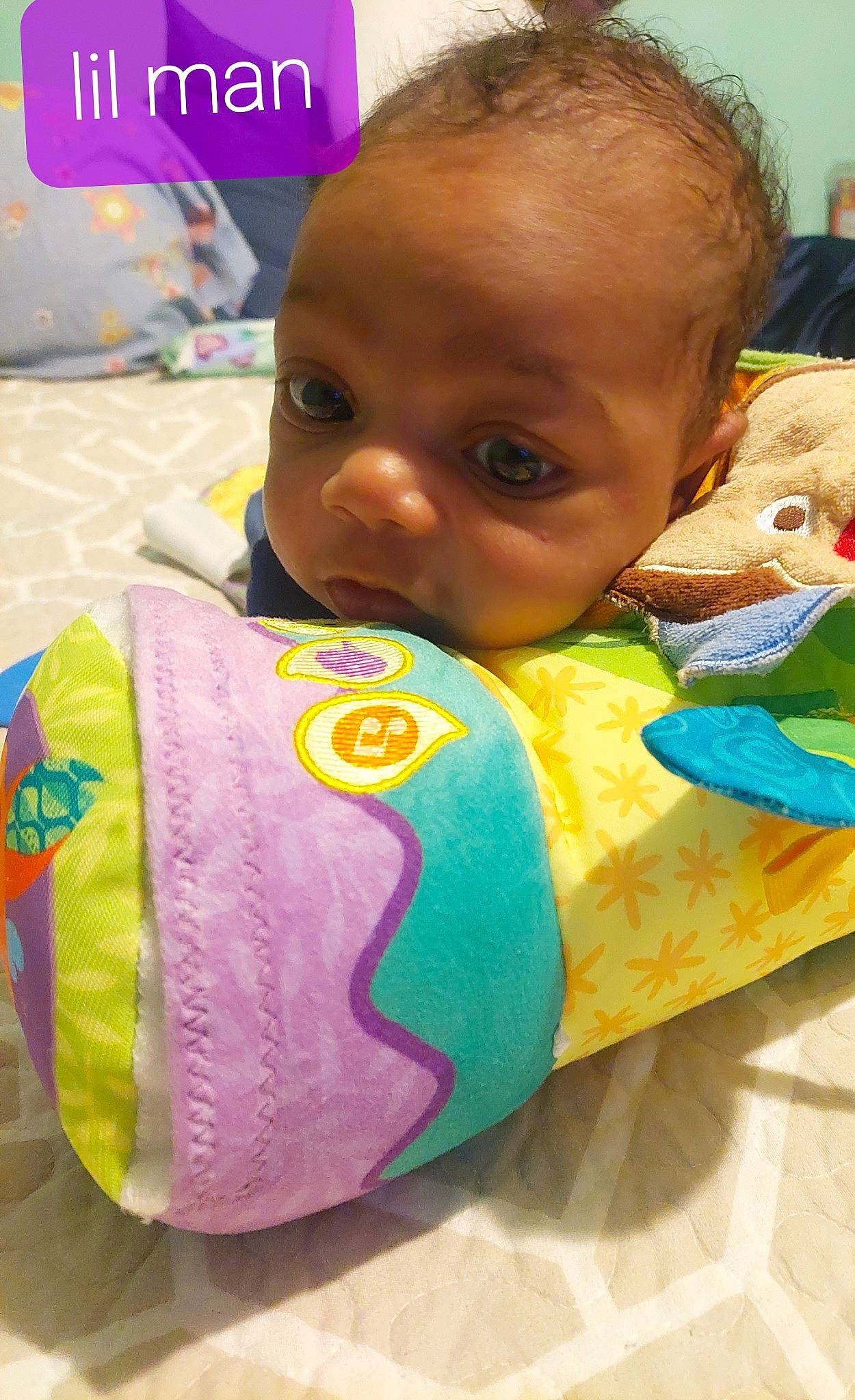 A'Mar is registered to the contest to win money with this photo: baby, baby_playing_with_toys, baby_products, baby_toddler_clothing, baby_toys, cheek, child, eyelash, face, fun, happy, head, linens, mouth, nose, person, play, room, skin, toddler