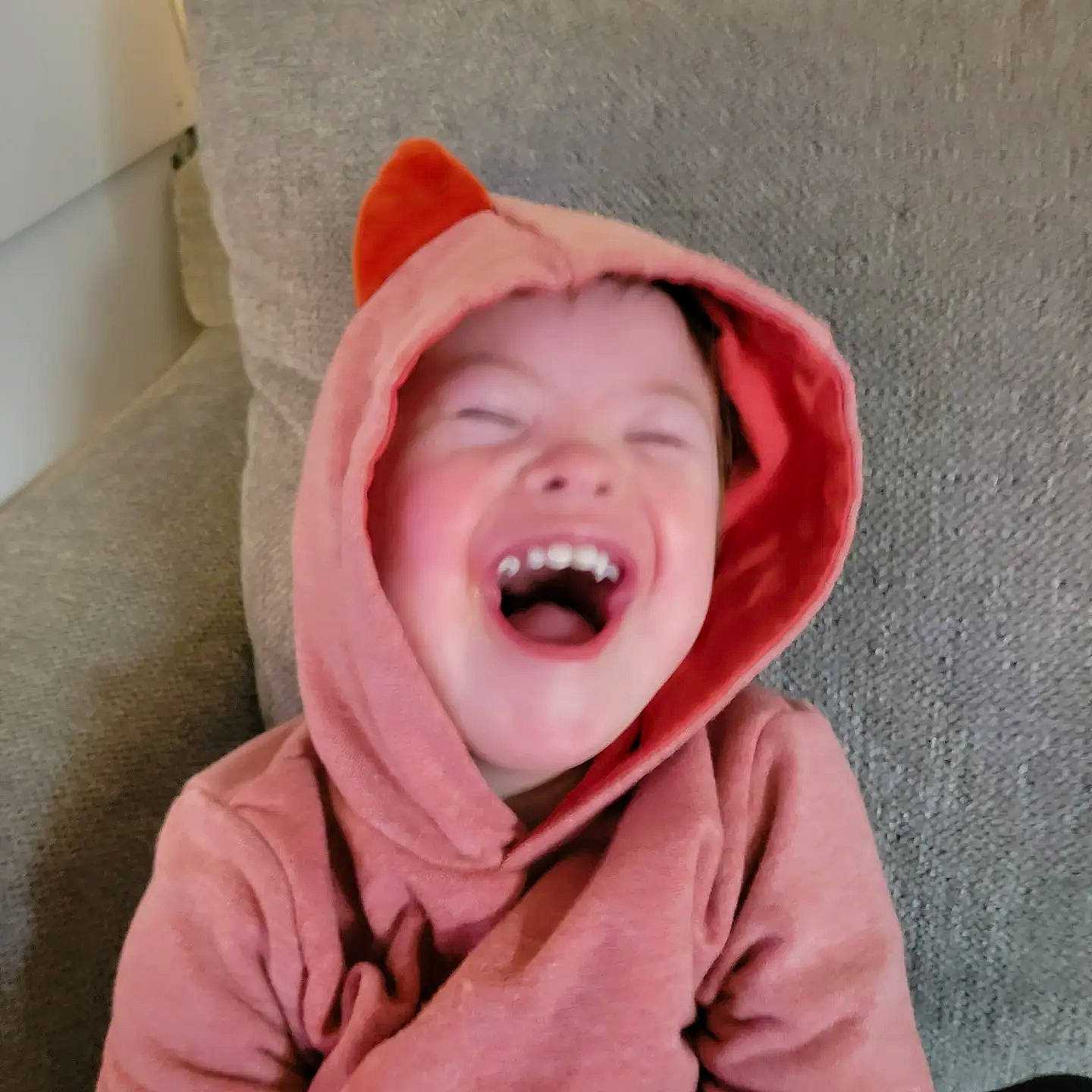 Jackson is registered to the contest to win money with this photo: baby, baby_laughing, carmine, cheek, comfort, eye, fun, gesture, happy, head, headgear, headwear, jaw, laugh, lip, nose, person, shout, sleeve, smile