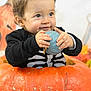 Jasme Marques participe au concours pour gagner de l'argent avec cette photo : toddler, child, pumpkin, halloween, costume, skeleton, blue_pumpkin, orange_pumpkin, decorations, holiday, cute, smiling, holding, festive, background, indoors, face, hands, seasonal, celebration