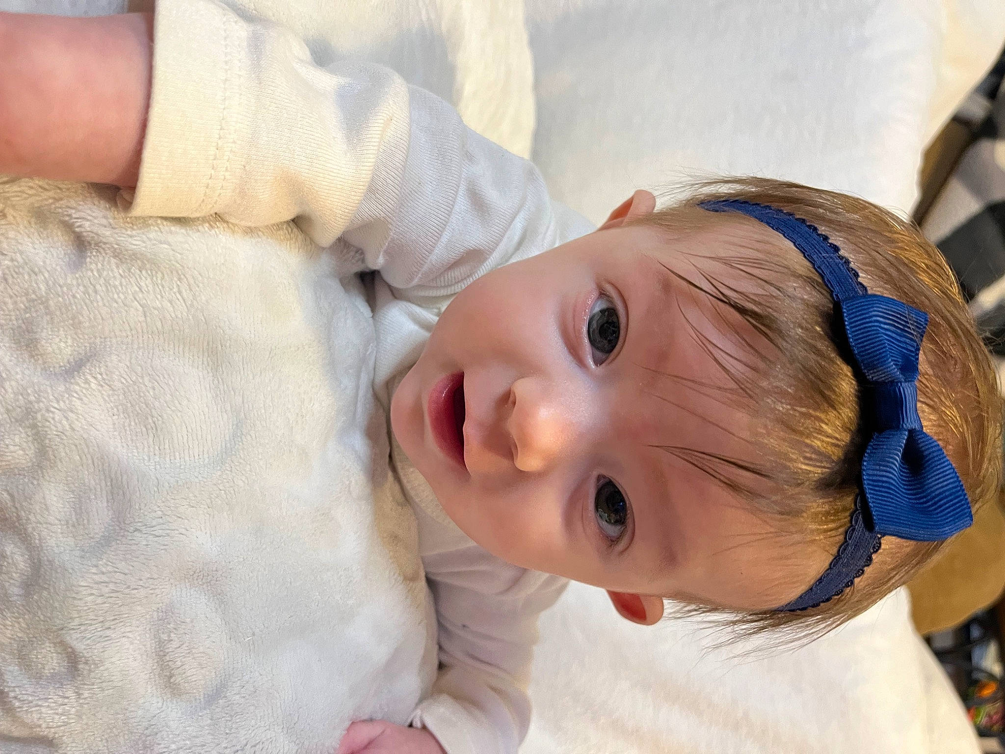 Ava is registered to the contest to win money with this photo: baby, baby_toddler_clothing, cheek, child, costume_hat, eye, eyelash, fashion_accessory, hair_accessory, happy, hat, head, iris, lip, person, portrait_photography, skin, sleeve, smile, toddler