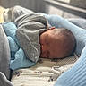 Brayden is registered to the contest to win money with this photo: baby, bed, blanket, child, closeup, clothing, comfort, cozy, crib, cute, head, indoors, infant, newborn, nursery, peaceful, portrait, rest, sleeping, soft