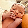 Brayden joined the competition — help win amazing prizes! newborn, baby, infant, face, hand, towel, cap, skin, close_up, portrait, indoors, soft_lighting, cute, small_fingers, resting, peaceful, human, child, hospital, wrapped