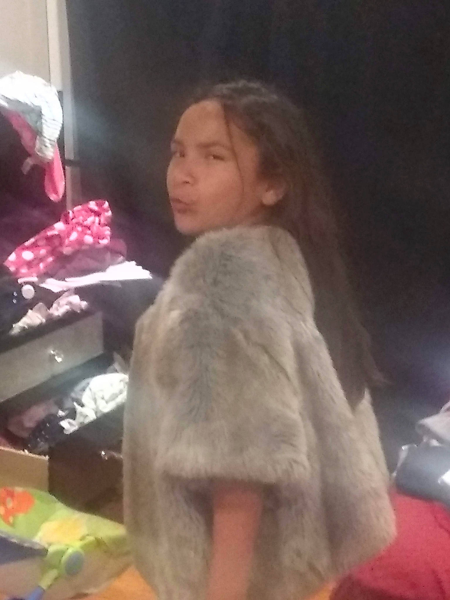 Angela is registered to the contest to win money with this photo: child, fur, fur_clothing, lady, long_hair, outerwear, person, textile