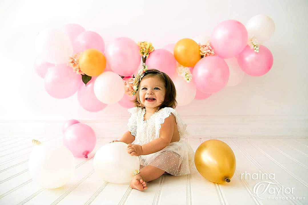 Angeline is registered to the contest to win money with this photo: balloon, child, happy, party_supply, person, photography, pink, smile, stock_photography, toddler, toy