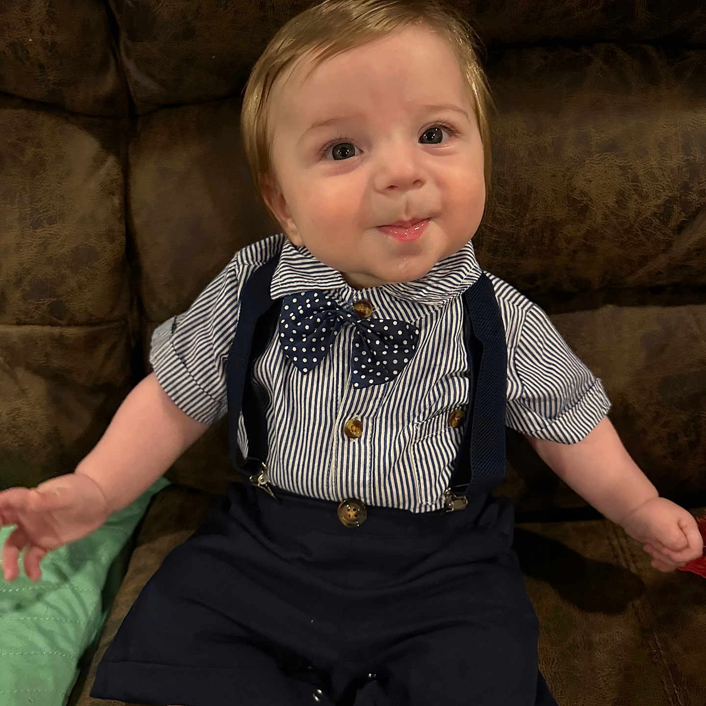 Chael joined the competition — help win amazing prizes! accessories, baby, clothing, couch, cushion, face, footwear, formalwear, furniture, head, pants, person, photography, portrait, shirt, shoe, shorts, sitting, suspenders, tie