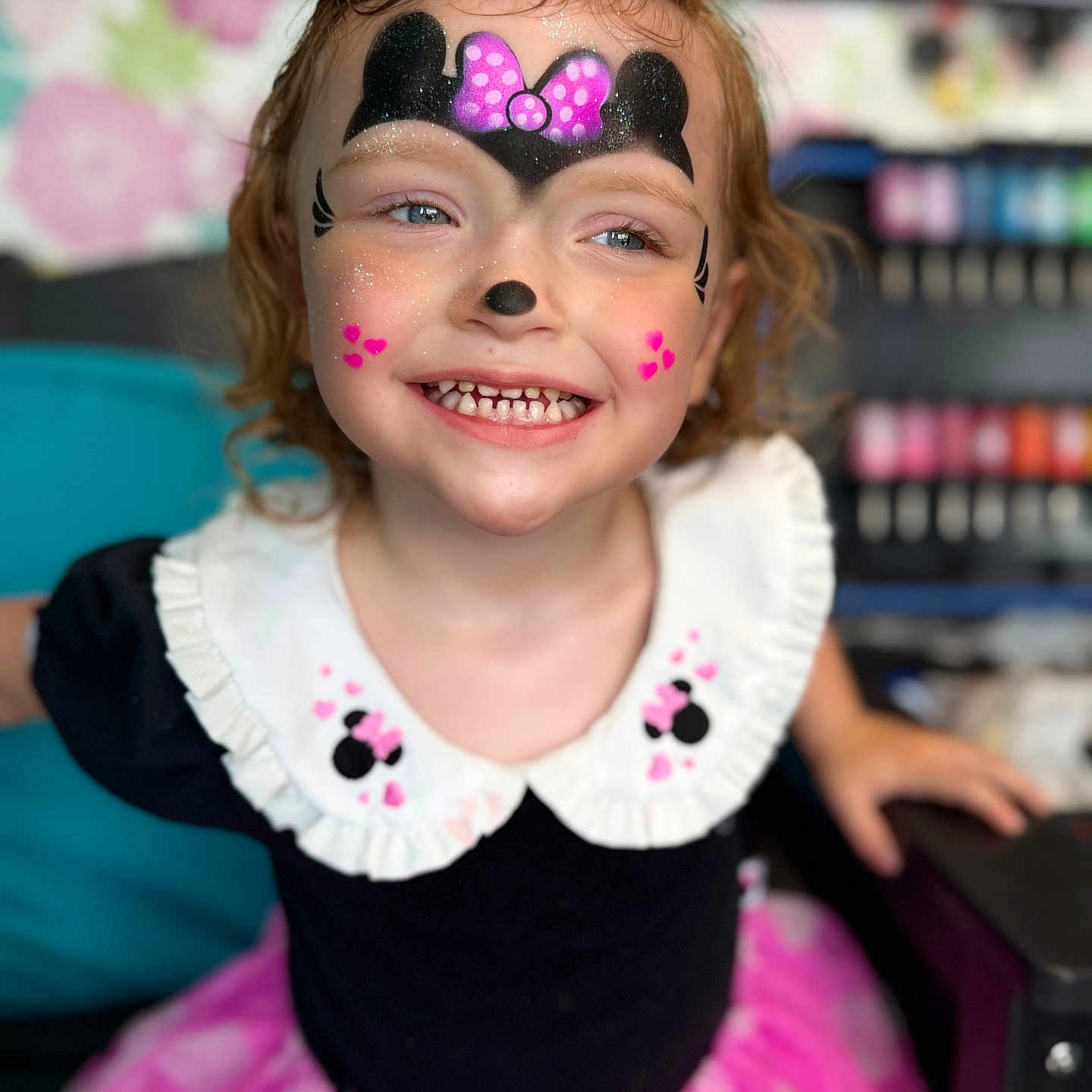 Saylor joined the competition — help win amazing prizes! black_top, blonde_hair, child, collar, costume, cute, face_paint, fashion, fun, girl, glitter, happy, indoor, minnie_mouse, person, pink_skirt, portrait, smile, toddler, white_collar