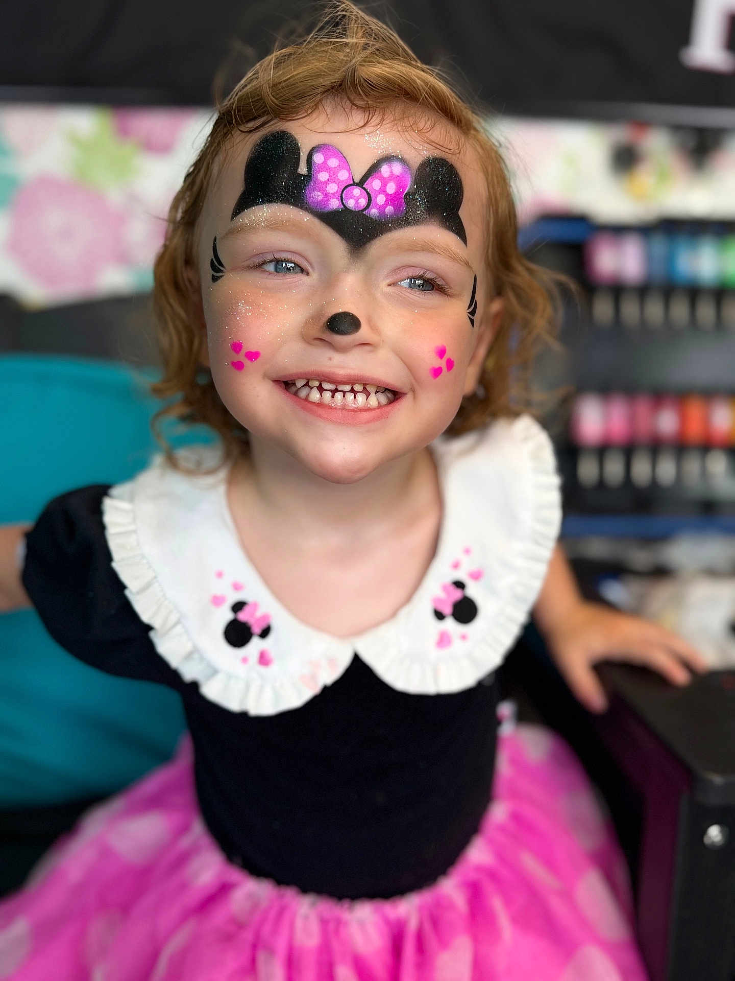 Saylor joined the competition — help win amazing prizes! child, face_paint, smile, girl, minnie_mouse, collar, pink_skirt, glitter, happy, portrait, cute, costume, fashion, toddler, black_top, white_collar, indoor, person, blonde_hair, fun