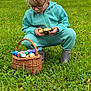 Luna participe au concours pour gagner de l'argent avec cette photo : basket, candy, child, chocolate, curious, daylight, easter, glasses, grass, green_field, nature, outdoor, person, playful, rural, spring, squatting, teal_tracksuit, trees, wrapped_candy