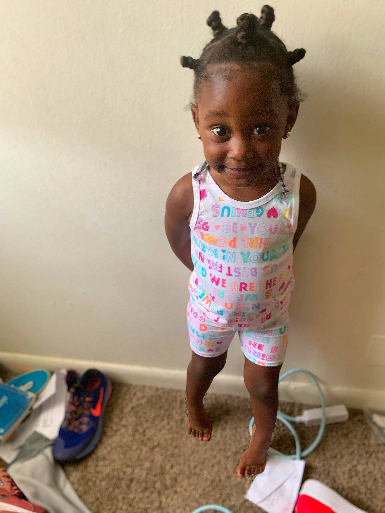 Aniylah is registered to the contest to win money with this photo: baby, baby_toddler_clothing, cheek, child, face, head, joint, joy, leg, pattern, person, pink, play, product, room, shoe, skin, standing, textile, toddler