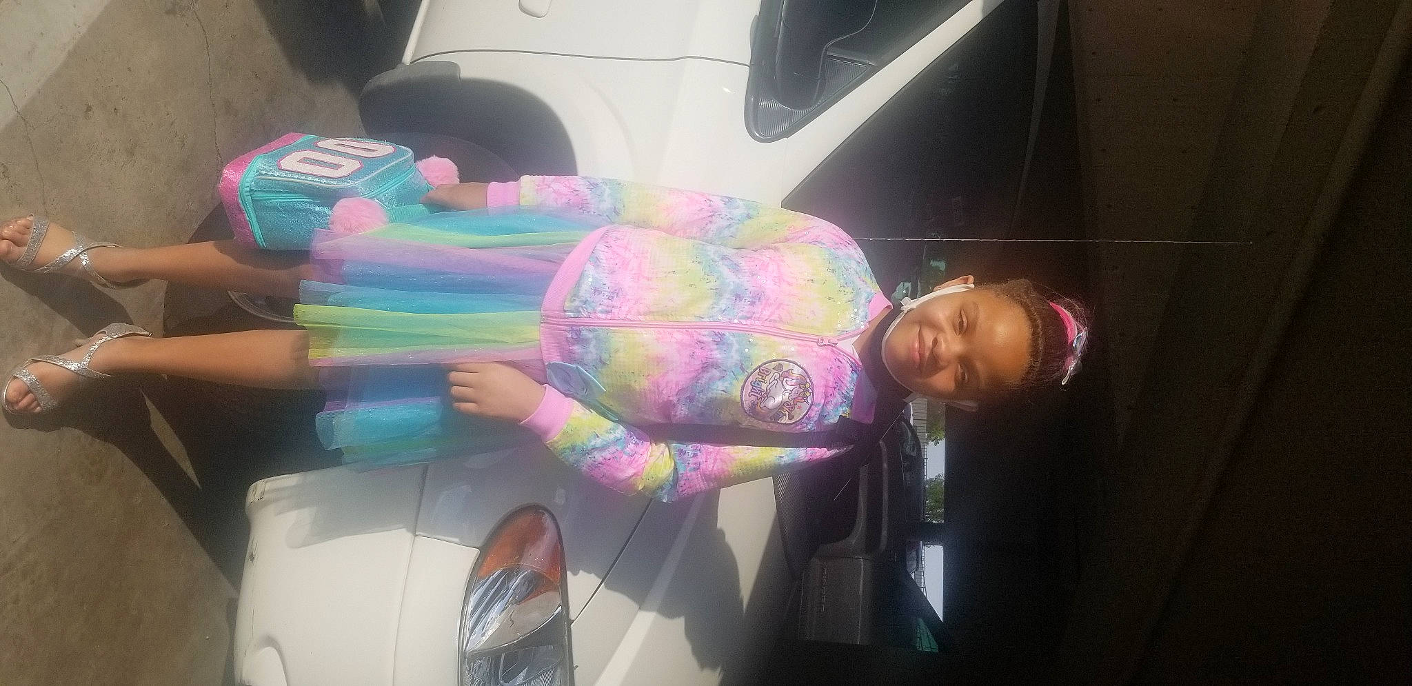 Alaynah is registered to the contest to win money with this photo: auto_part, automotive_design, automotive_exterior, automotive_lighting, automotive_tail_brake_light, bumper, car, cool, eyewear, family_car, fun, hood, joy, luxury_vehicle, magenta, motor_vehicle, person, personal_luxury_car, pink, trunk