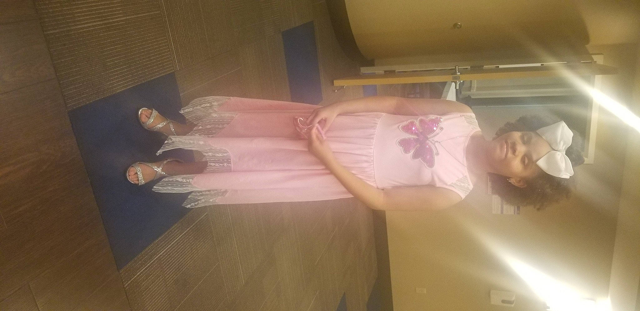 Alaynah is registered to the contest to win money with this photo: abdomen, chest, comfort, day_dress, dress, event, flesh, flooring, fun, hardwood, headwear, human_leg, joy, knee, person, room, textile, thigh, trunk, waist