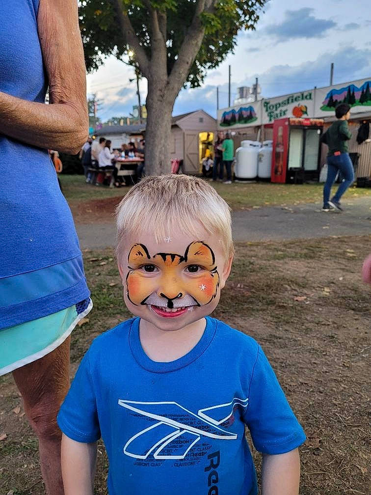 Teagan joined the competition — help win amazing prizes! azure, blue, community, daytime, electric_blue, eyewear, fun, gesture, grass, happy, joy, leisure, moustache, person, plant, recreation, sky, summer, t_shirt, toddler