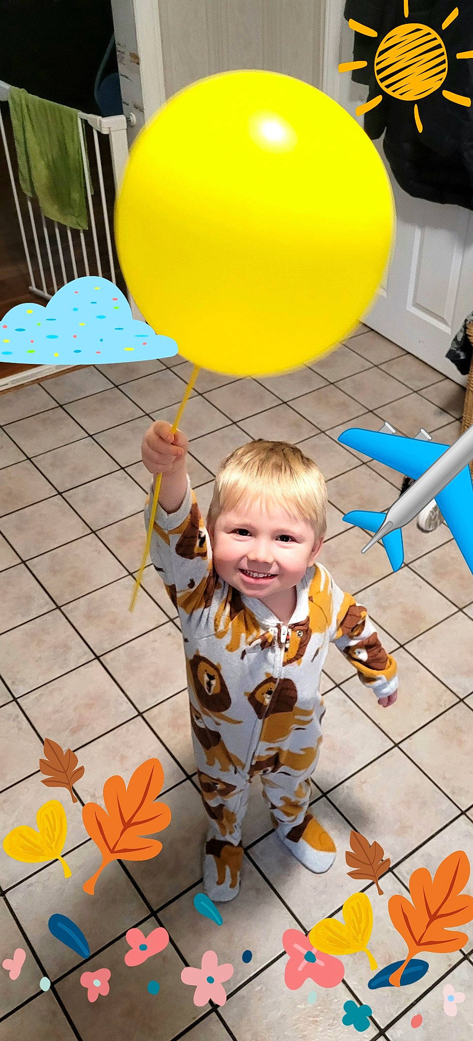 Teagan is registered to the contest to win money with this photo: art, baby, baby_toddler_clothing, balloon, child, event, flooring, fun, happy, joy, leisure, line, orange, pattern, person, photograph, smile, snapshot, t_shirt, toddler