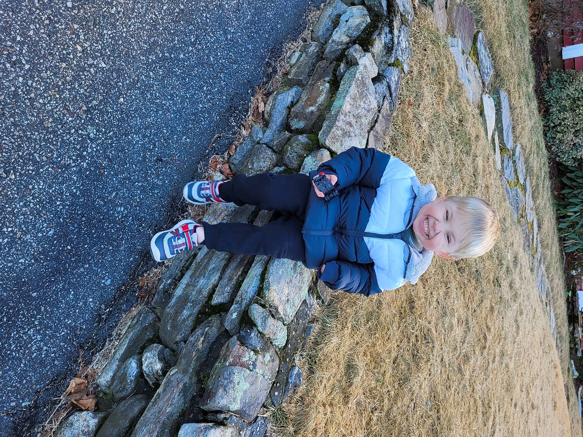 Teagan is registered to the contest to win money with this photo: adventure, asphalt, azure, bedrock, concrete, denim, electric_blue, fun, joy, landscape, leisure, outdoor_shoe, people_in_nature, person, recreation, road_surface, rock, rock_climbing_equipment, shadow, travel
