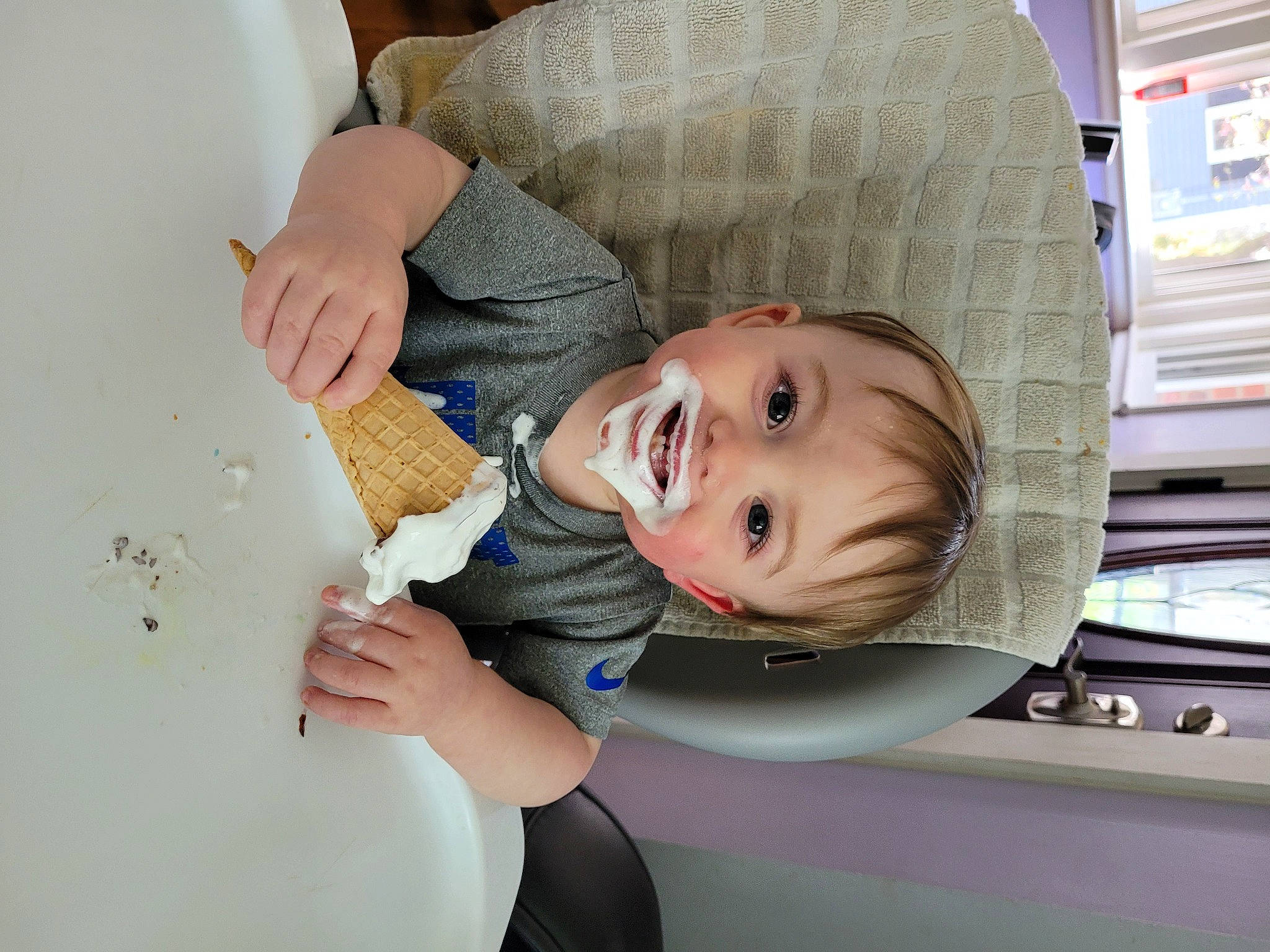 Tyler is registered to the contest to win money with this photo: baby, baby_toddler_clothing, cheek, child, comfort, elbow, facial_expression, fun, hairstyle, happy, joy, person, product, room, sitting, skin, smile, toddler, vacation