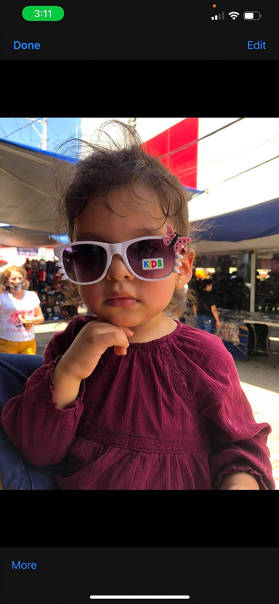 Laramie is registered to the contest to win money with this photo: chin, cool, eyewear, face, facial_expression, fun, glasses, goggles, hairstyle, happy, head, leisure, lip, mouth, person, pink, skin, sunglasses, toddler, travel