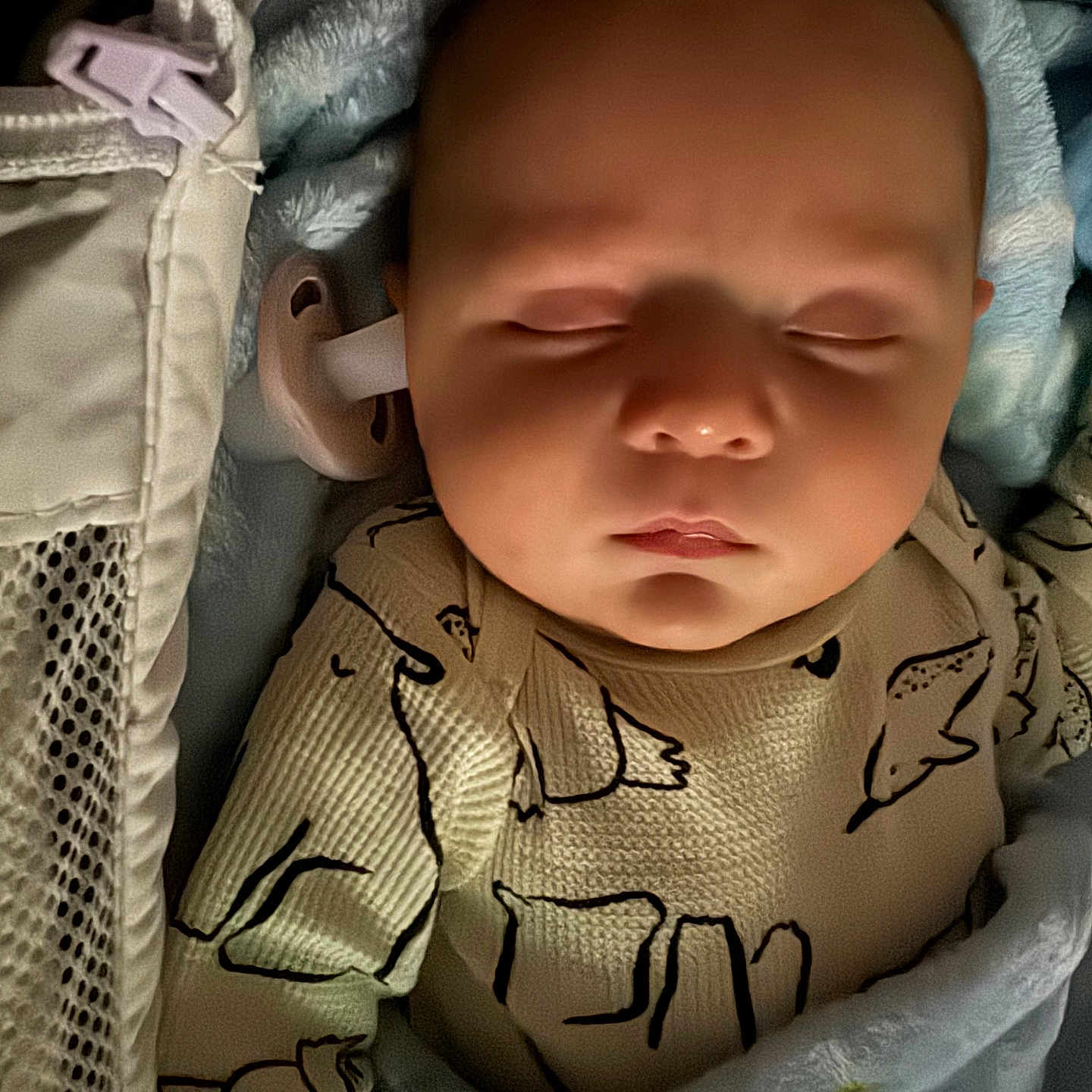 Nicholas is registered to the contest to win money with this photo: baby, sleeping, infant, pacifier, blanket, clothing, cozy, face, head, rest, peaceful, indoors, soft_lighting, cute, portrait, child, newborn, bedtime, comfort, warm