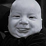 baby, smile, tongue, face, closeup, black_and_white, child, infant, chubby_cheeks, portrait, cute, happy, young, expression, person, clothing, indoors, head, skin, eyes