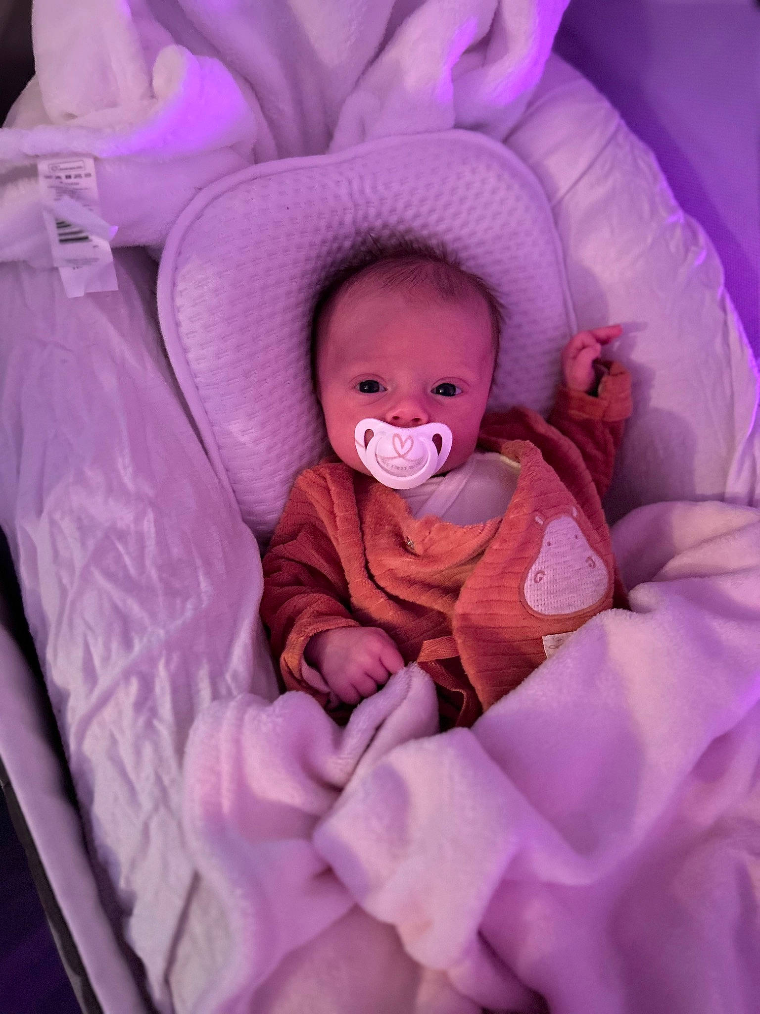 Lya participe au concours pour gagner de l'argent avec cette photo : baby, baby_products, baby_toddler_clothing, baby_toys, child, comfort, fun, happy, infant_bed, linens, magenta, peach, person, petal, pink, purple, stuffed_toy, textile, toddler, toy