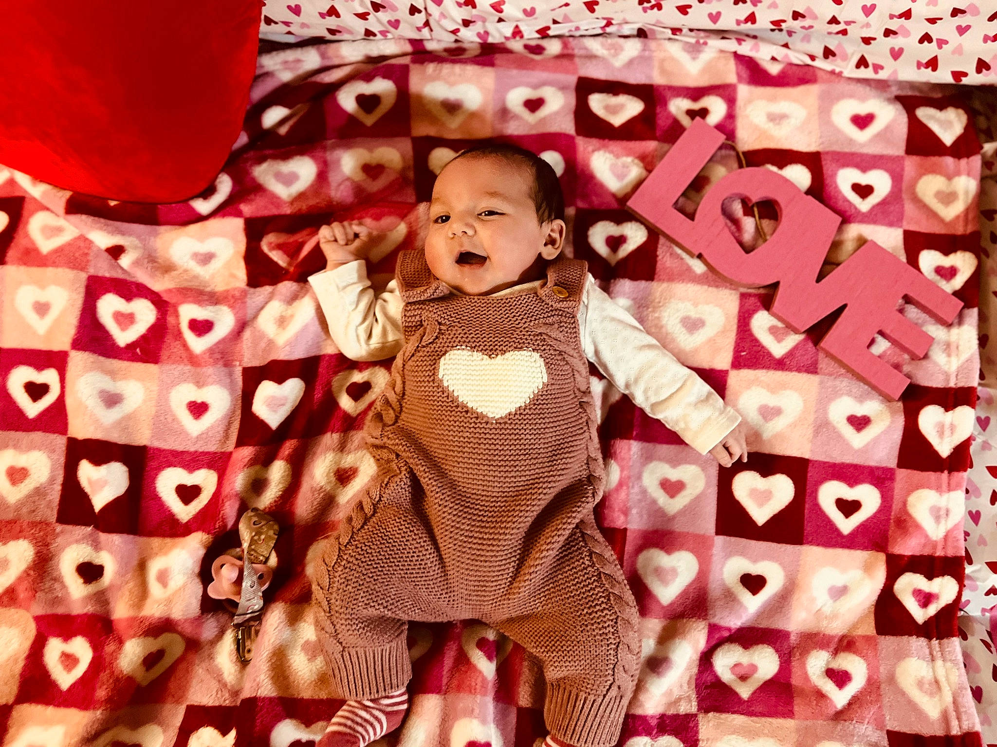 Penelope is registered to the contest to win money with this photo: beauty, carmine, design, doll, entertainment, event, fashion, font, happy, linens, magenta, ornament, pattern, performing_arts, person, pink, sleeve, textile, thigh, toy